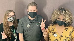 people posing after getting vaccinated