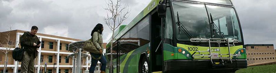 People getting on bus