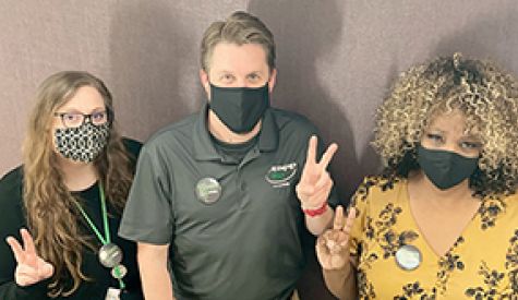 people posing after getting vaccinated